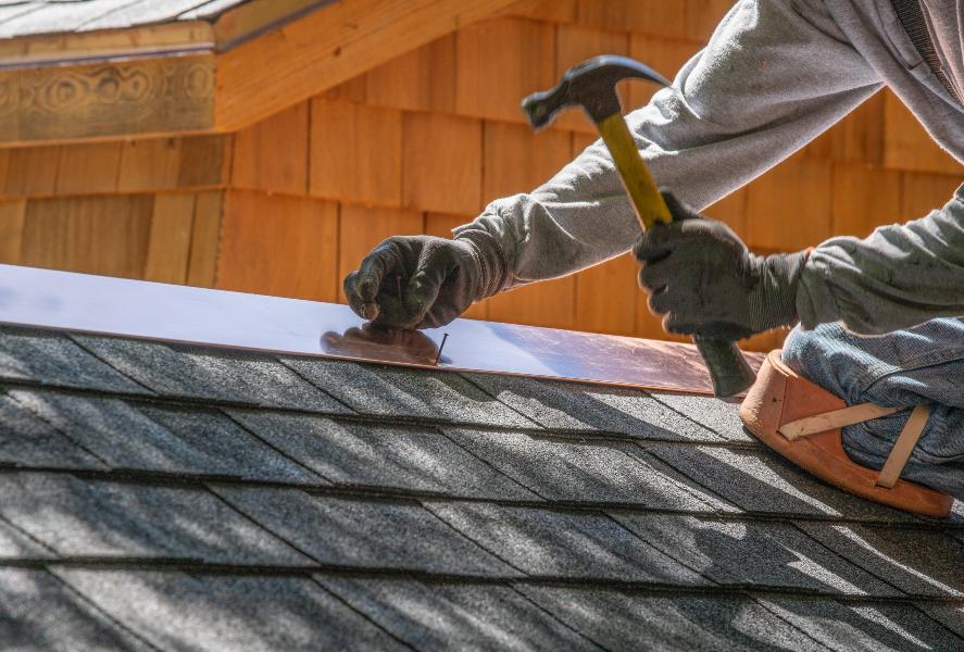 Worker Repairing Roof in Miami-Dade, FL