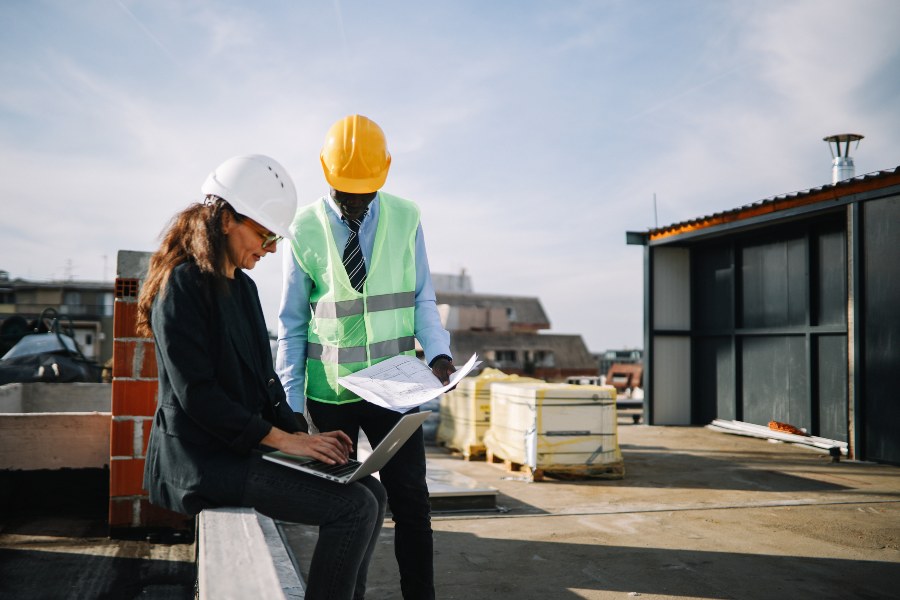 An Engineer & Contractor Discussing Commercial Roofing Installation Plan in South Florida