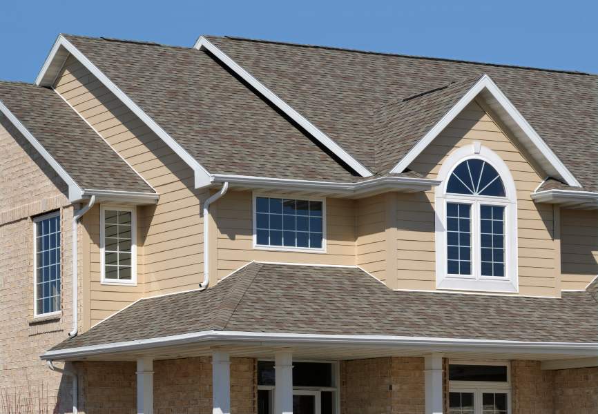 A Modern House Highlighting Tile Roof Installed by Paul Bange Roofing in South Florida
